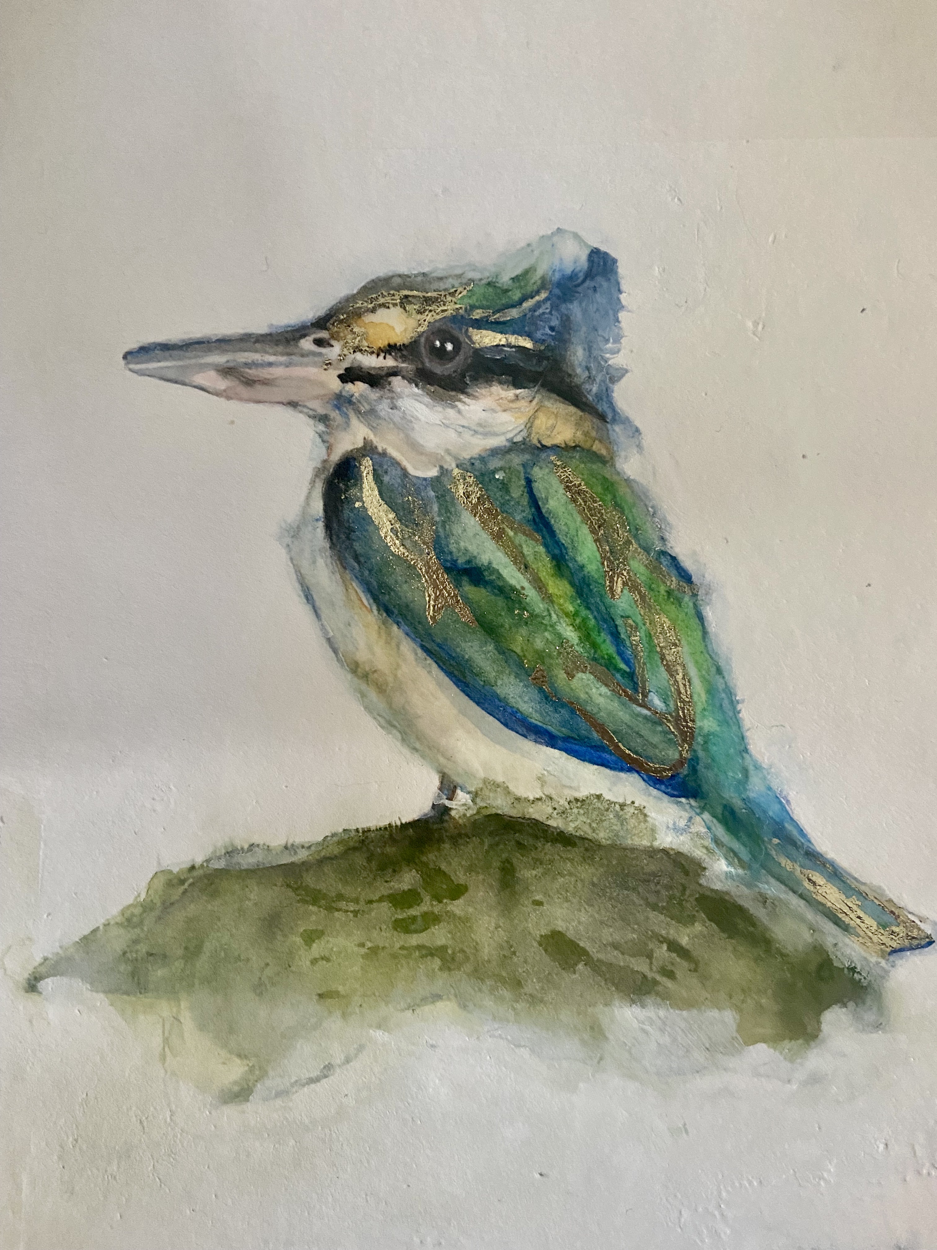 A watercolor of a Kingfisher