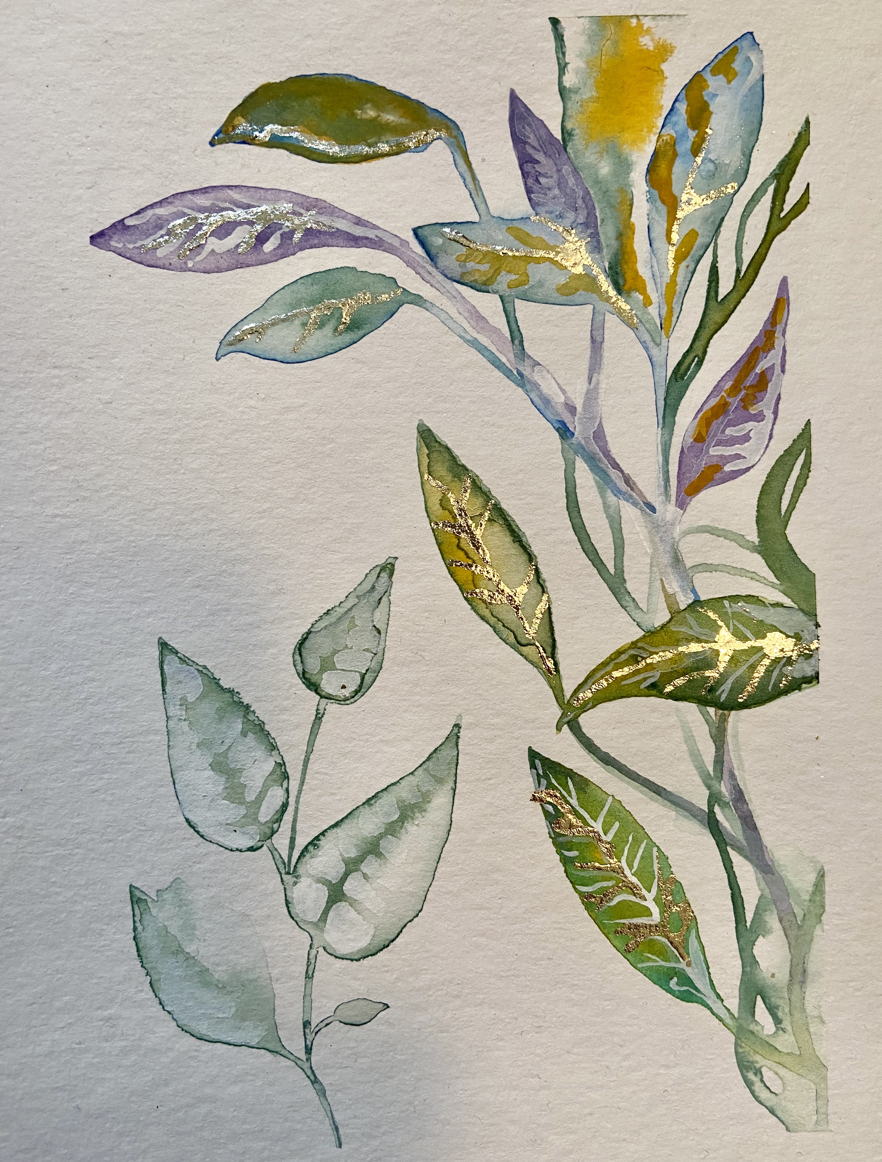 A watercolor of leaves with gold leaf detail.